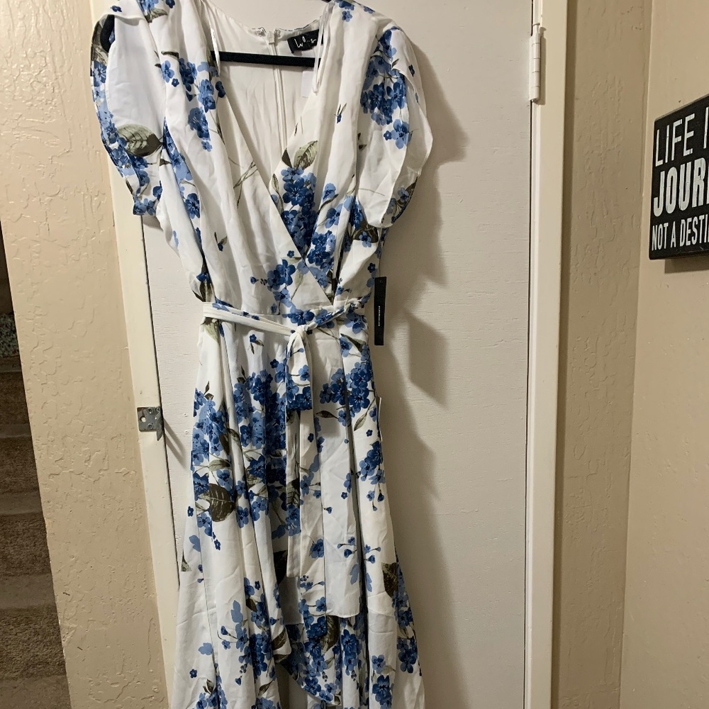 White dress with blue floral print